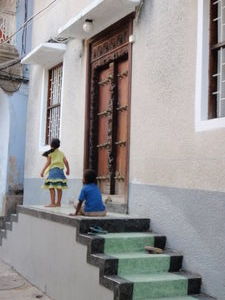 Children playing on the doorstep across from my homestay
