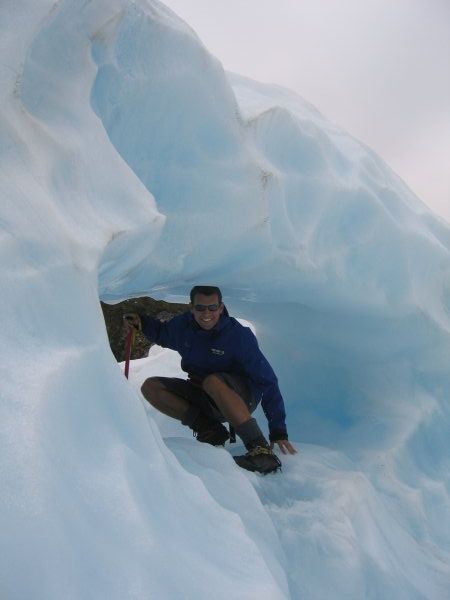 Ian climbing through holes in the ice