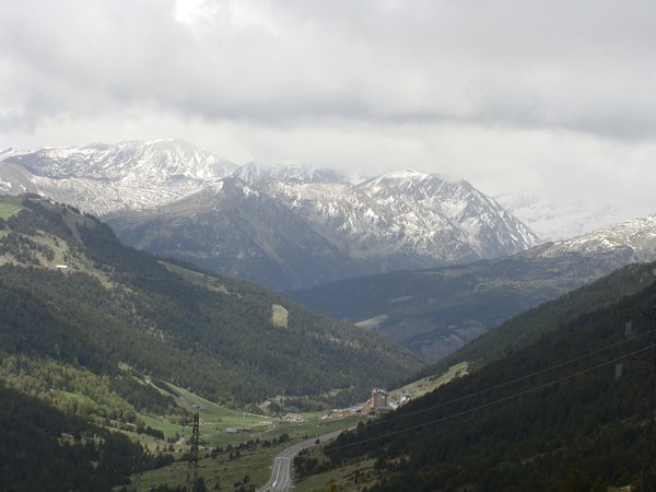 Driving to the summit of the Pyrenees, snow on the tops