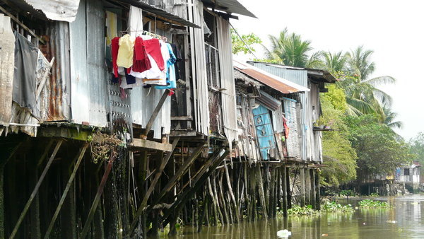 Houses along the riverside, Can Tho, Vietnam