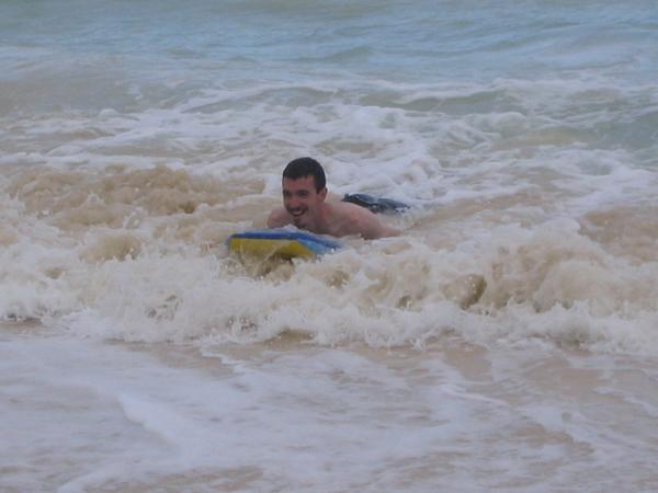 John catching a wave