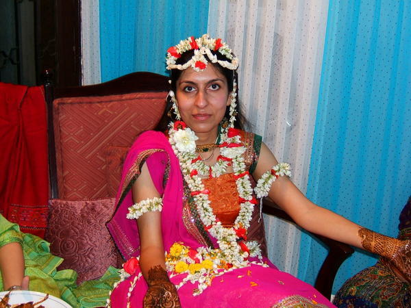 Bride getting henna at her family home