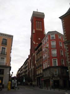 this big tower there is a church in Madrid.