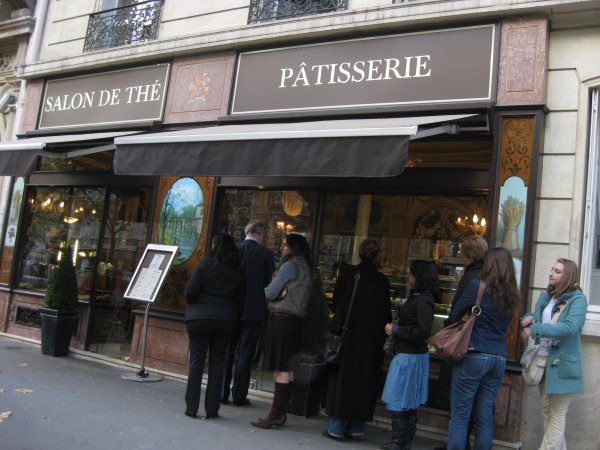 Locals queing up for French pastries... let's join them!