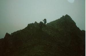 On an Alaskan ridgeline, in the clouds, off course, but lovin' the adventure