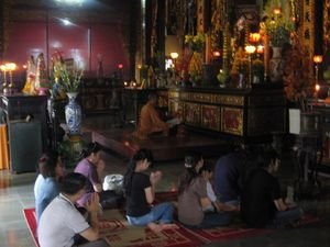 Buddhist gather to pray in the temple
