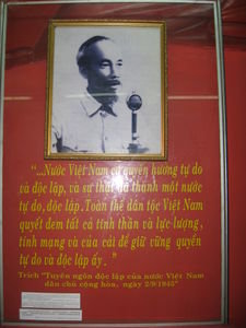 A picture of Ho Chi Minh mounted on the museum wall