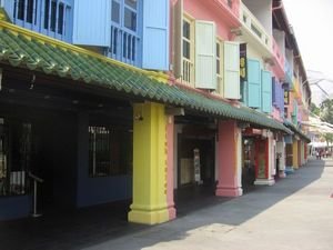 A line of multi-colored shops