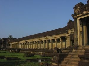 Long hallways stretch off of the main Angkor Wat temple
