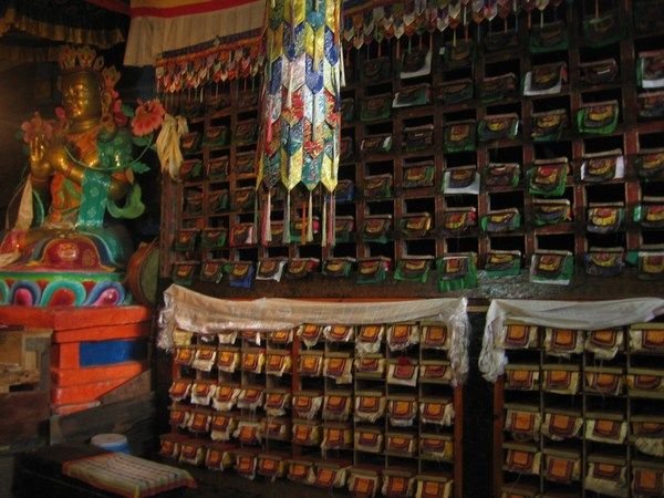 Drawers of Buddhist scripture lines the walls of the Himalayan monastery