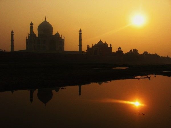 The sun sets over the Taj