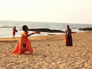 Young Indian girls playing on the beach in Goa