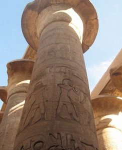 Giant pillars covered in hieroglyphics are positioned all through the Karnak temple