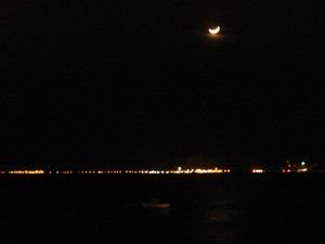 A crescent moon floating over Eilat, Israel