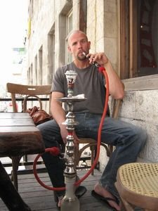 Puffing on my waterpipe at the local cafe in Amman