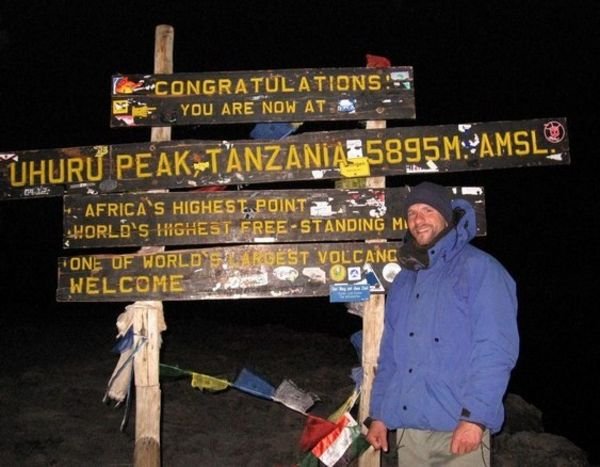 At Uhuru Peak on the summit of Mt. Kilimanjaro 