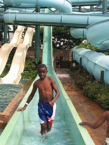 A strut from Josephat after he braved the giant slide 