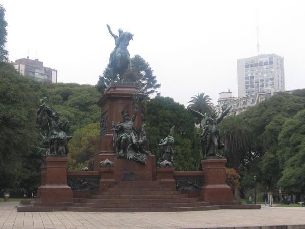 Statues stand in ever plaza across the city