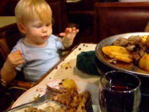 Tucking into his first parrillada
