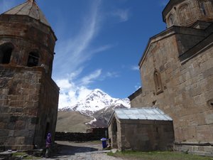 Kazbek beyond the church 