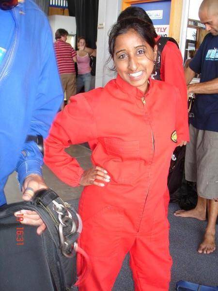 Sporting a sexy red sky-dive jump suit