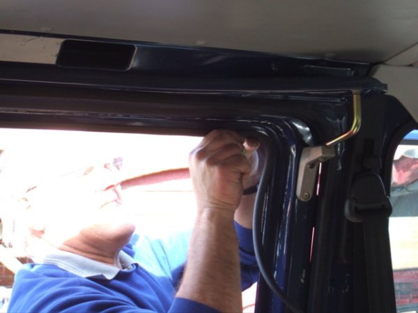 Trimming the nearside window frame