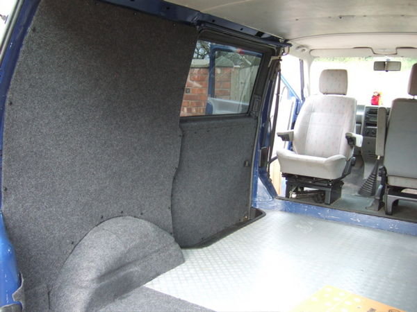 The back of the van - carpeting nearly done