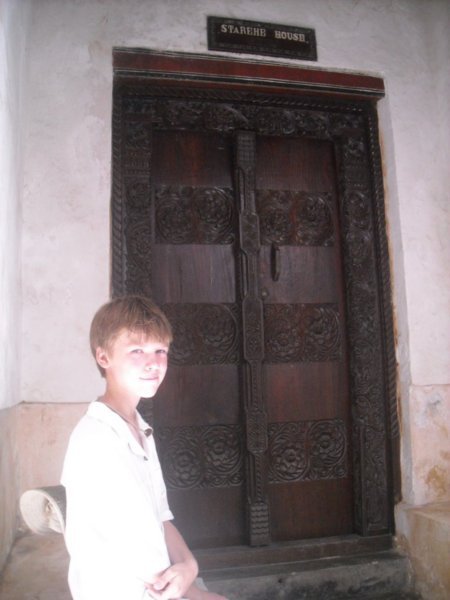 Lukas with Lamu door