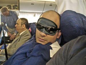 Ed sleeping on the plane