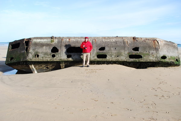 John in front of some of the washed up temporary harbour
