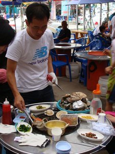 Mr. Lee cooking lunch