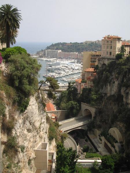 Another view of the bay and below the road with the tunnel is part of the Monte-Carlo Grand Prix race track