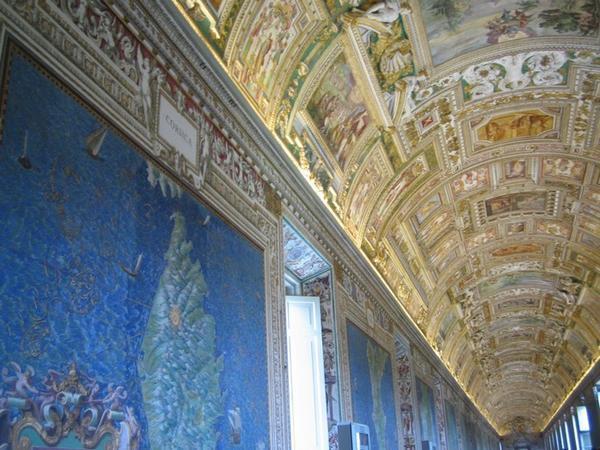 The ornate hallway leading to the Sistine Chapel