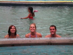ann, whitney, and john in the indoor pool