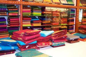 Stacks of folded saris