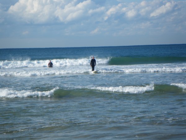 Ewan and Oliver surfing