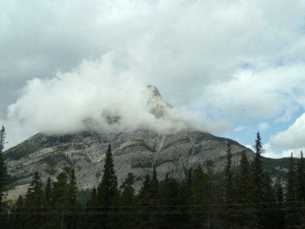 Clouds envelop this mountain