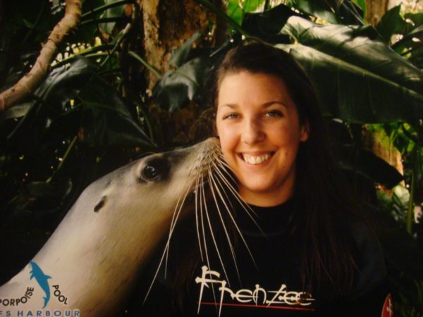 Hayley getting a kiss from a seal!