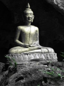 at the entrance of the cave of Budddhas