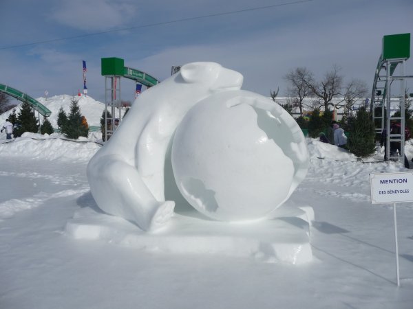 Polar bear and world ice sculpture
