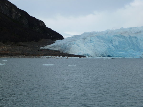 If you look closely the people are still stood by the side of the glacier...