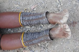 23 - anklets indicate 2 children