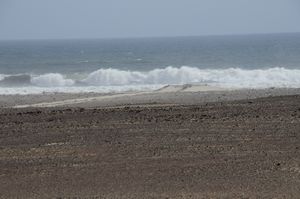 61 - One wave crashing onto the coast