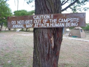 115 - warning sign at serengeti campsite