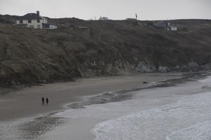 76 - Eleni and David walking along the beach near St David's
