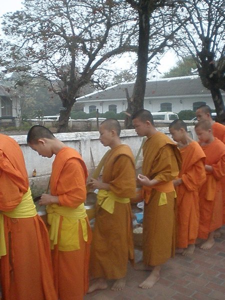 Monks getting their daily food 
