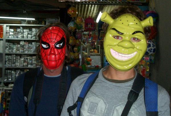 Spiderman and Shrek try out their costumes for the carnival