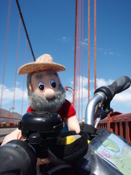 Eric riding across the Golden Gate Bridge