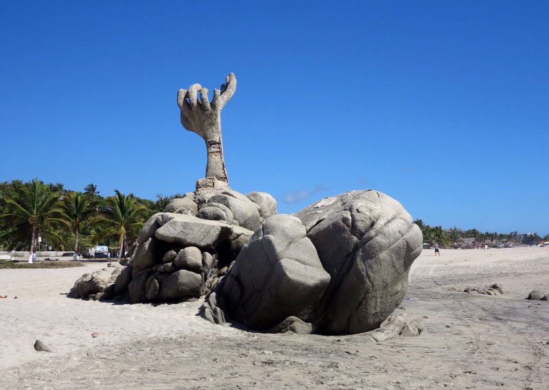 Hands Sculpture on Beach