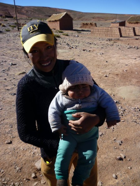 Bribing babies with lollypops on route to Uyuni